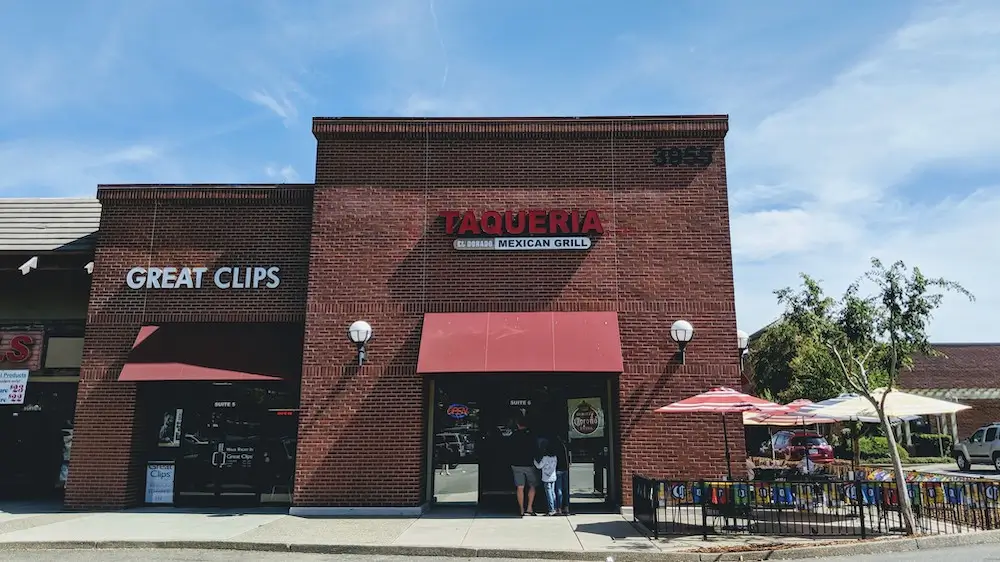 Taqueria El Dorado restaurant with its outdoor patio and shade umbrellas
